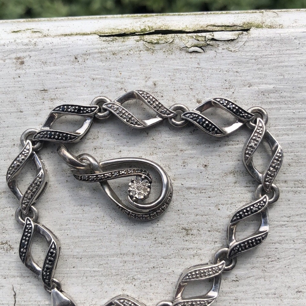 Black & White Diamond tennis bracelet set in sterling silver!